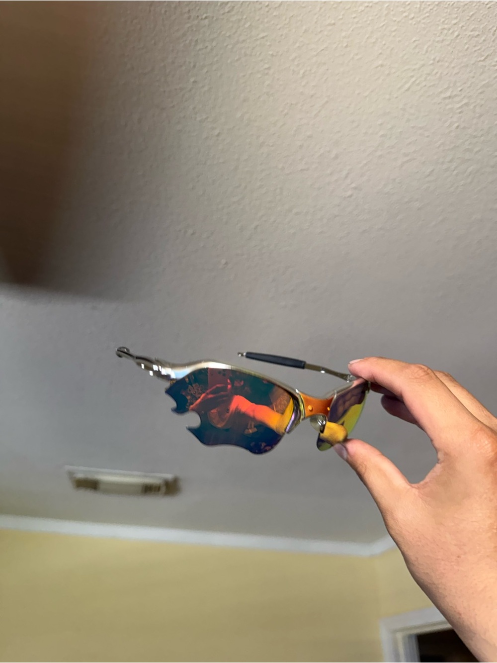 Reflective Rimless Sunglasses with Orange-Red Mirrored Lenses Oakley